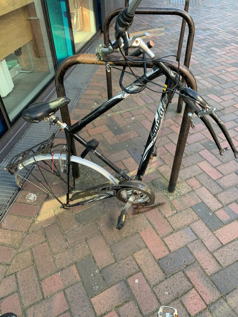 Bicycle with both wheels removed 